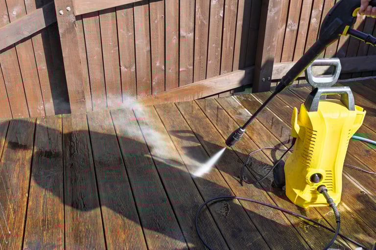 Deck being pressure washed